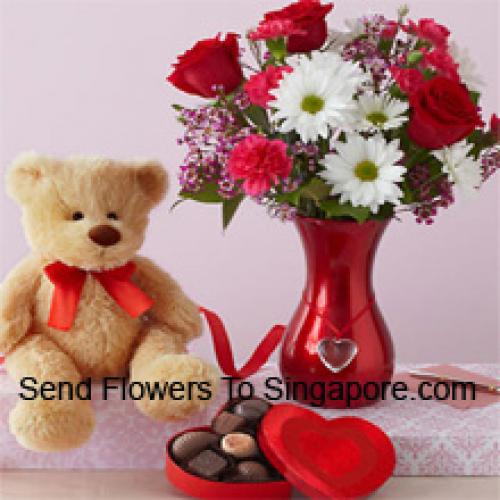 Roses en Gerbera's met schattige teddybeer en chocolaatjes